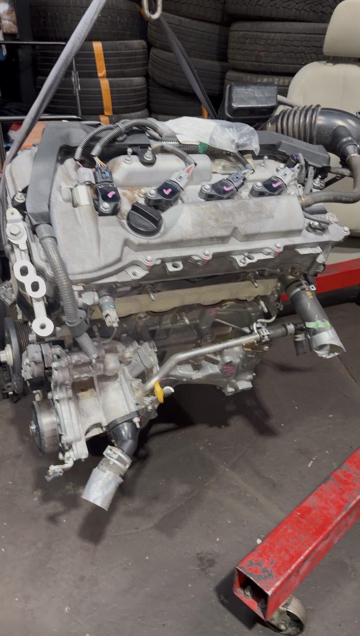 Street Motors Canada mechanic installing JDM Toyota engine into 2012 Toyota Venza — engine swap Toronto